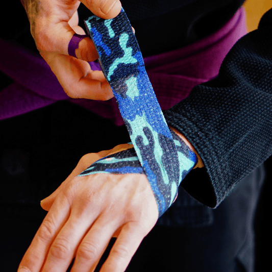 BJJ Flex Joint Support Tape 38mm Blue Camo (6.9m Elastic Wrap Single Roll) - Sticky Grips - wrist application