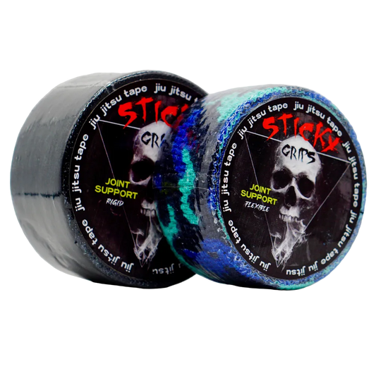 Two rolls of 'Sticky Grips' joint support tape with skull design on a white background.