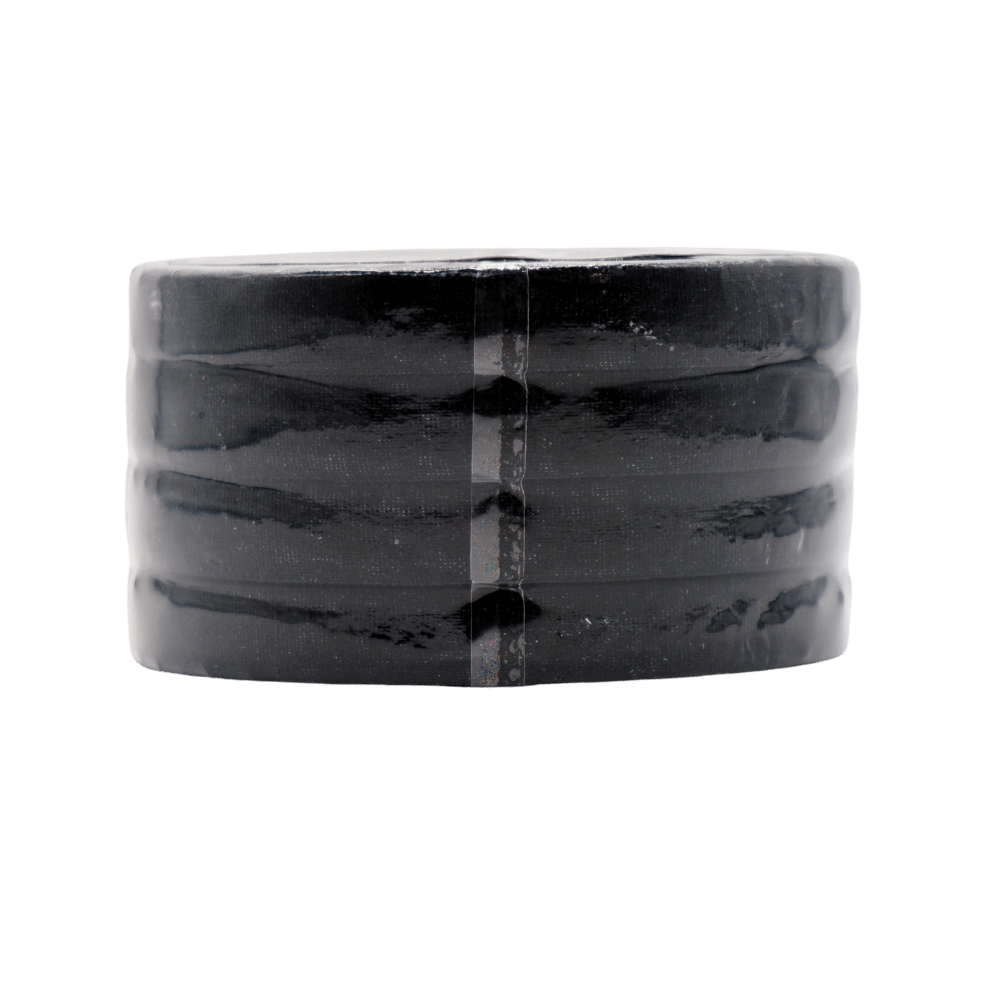Sticky Grips Pro BJJ Finger Tape 10mm black 4 roll refill pack stacked rolls side view