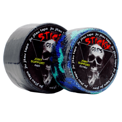 Two rolls of 'Sticky Grips' joint support tape with skull design on a white background.