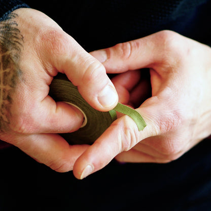 Sticky Grips low stretch BJJ finger tape khaki close up showing texture and thickness