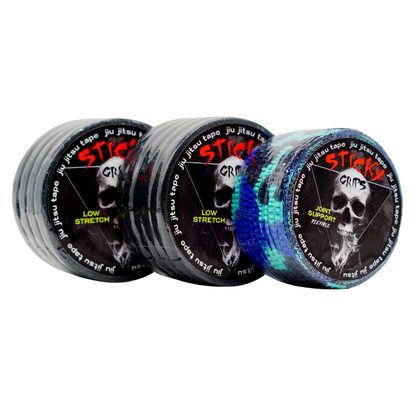 Three rolls of 'Sticky Grips' jiu jitsu tape on a white background