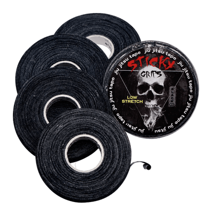 Black tape rolls with a 'Sticky Grips' logo  featuring a skull design on a white background.