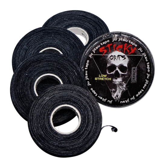 Black tape rolls with a 'Sticky Grips' logo  featuring a skull design on a white background.