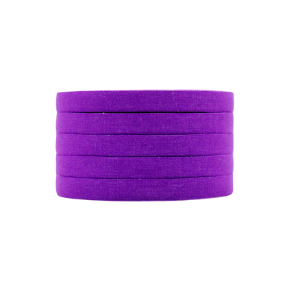 Sticky Grips purple BJJ finger tape 8mm low stretch refill pack 5 rolls 10m stacked rolls close view
