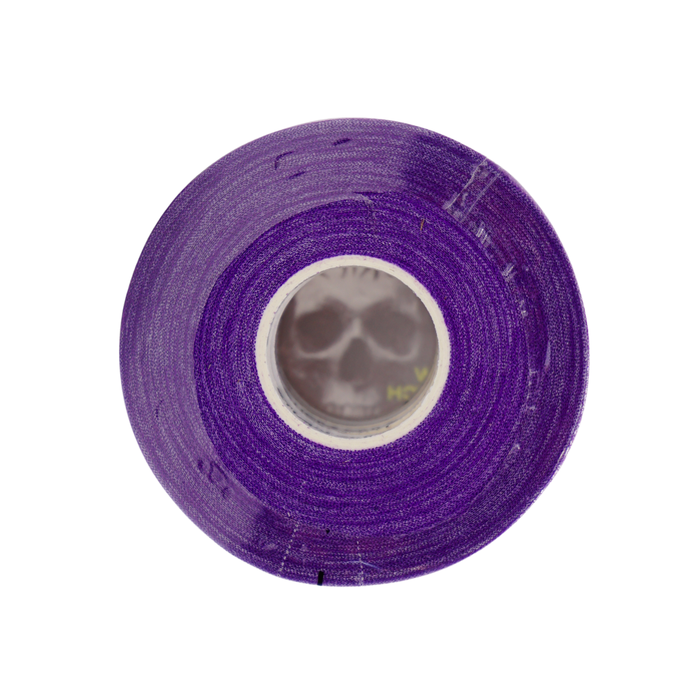 Top view of Sticky Grips purple 8mm BJJ finger tape low stretch 10m roll showing inner core branding